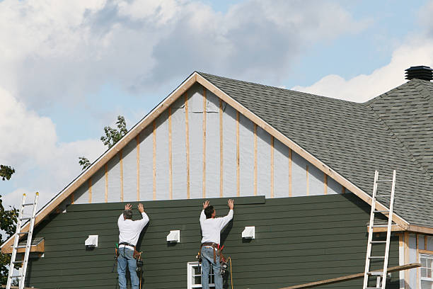 Professional Siding Installation technician working in Holliston, MA